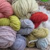 hanks of wool yarn showing the colours achieved iwth natural dyes