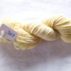 twisted skein of pale yellow yarn