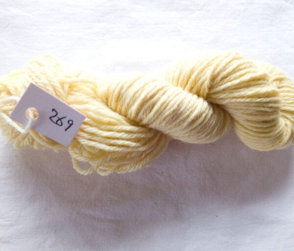 twisted skein of pale yellow yarn