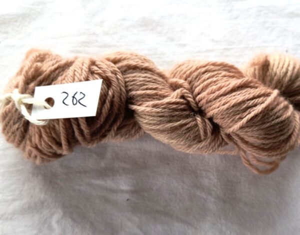 twisted skein of dark fawn yarn