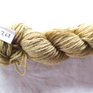 twisted skein of olive green yarn with darker brown flecks