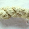 twisted skein of pale olive green yarn