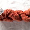 twisted skein of russet red yarn