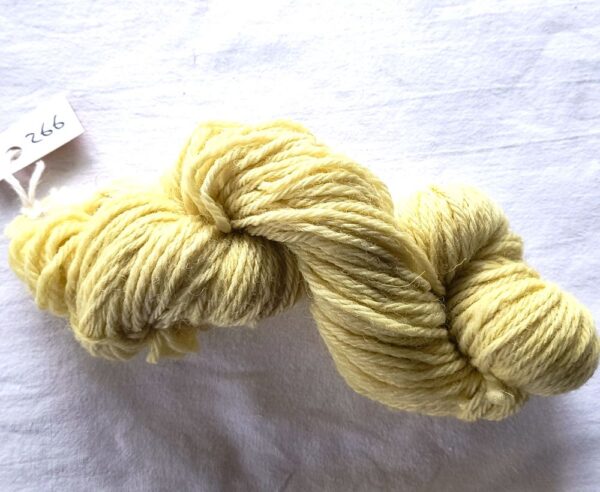 twisted skein of yellow yarn