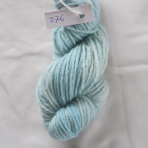 turquoise blue skein of aran weight yarn on a white background with a label 276